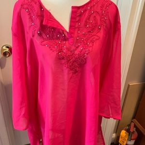 Sheer hot pink bathing suit coverup